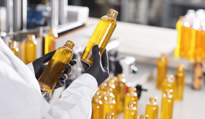 lab technician holdnig medical tests vials