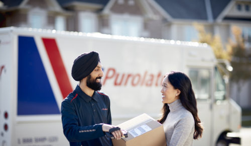 Purolator-courier-delivers-smiling-woman-shipment-reduce-delivery-times