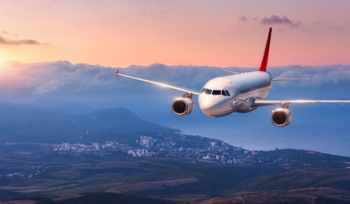 Cargo airplane travelling to destination.