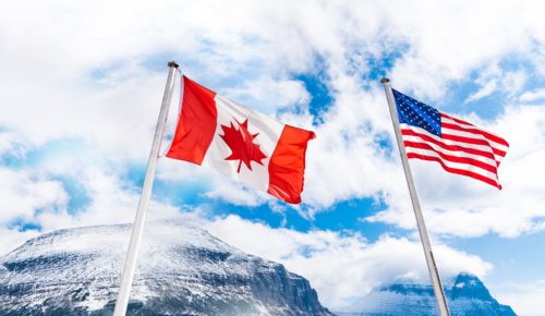 Canadian and US flags at border when shipping industrial parts